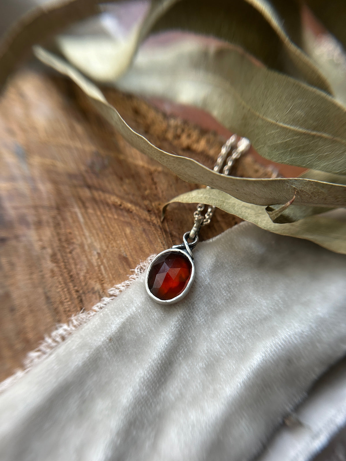 Custom pendant- pietersite with simple twist bail and sword/oak leaf/moon and star engraving
