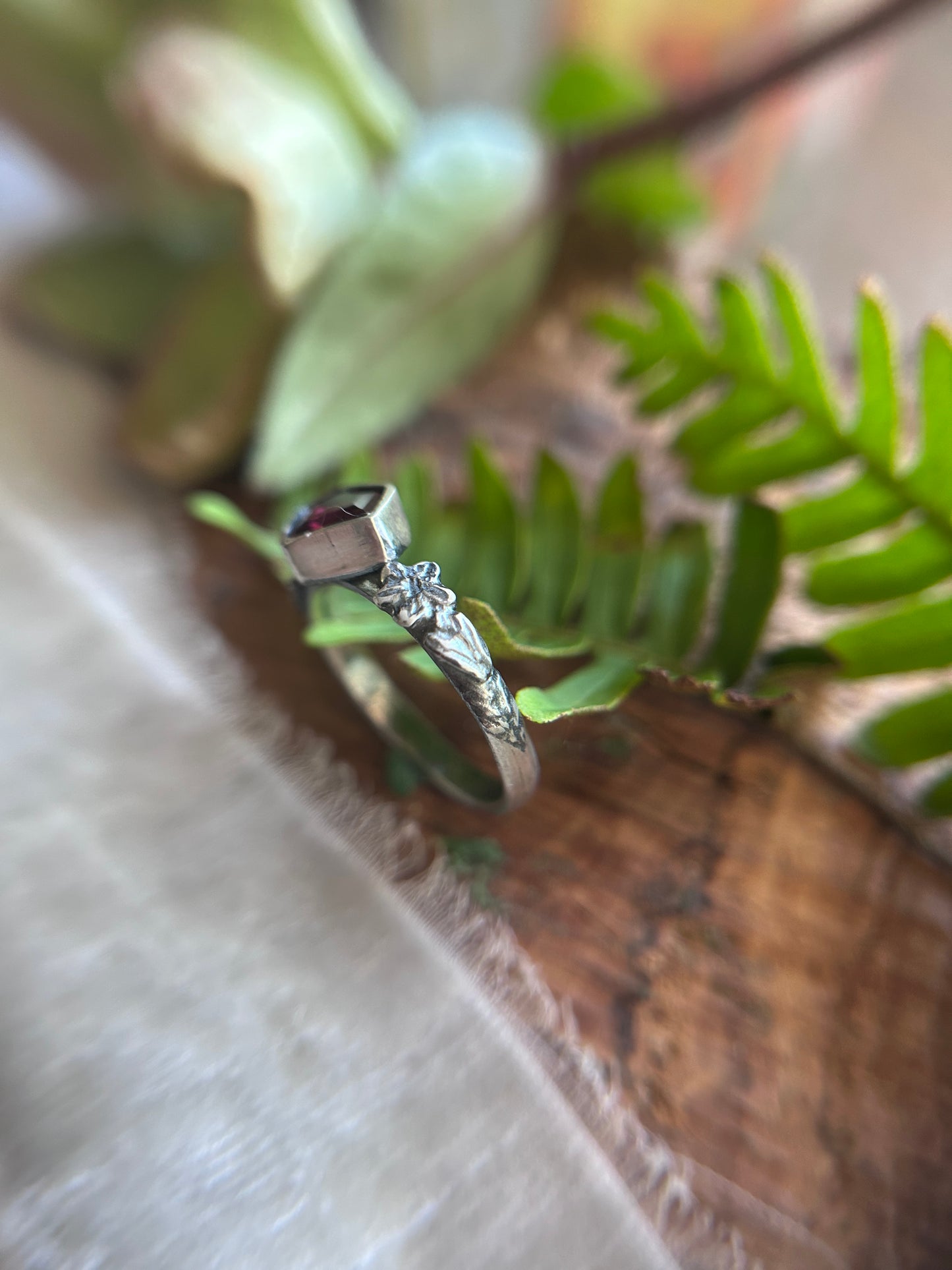 Azalea flowers and skull ring with portrait cut shield shaped rhodolite garnet- Sterling silver jewelry