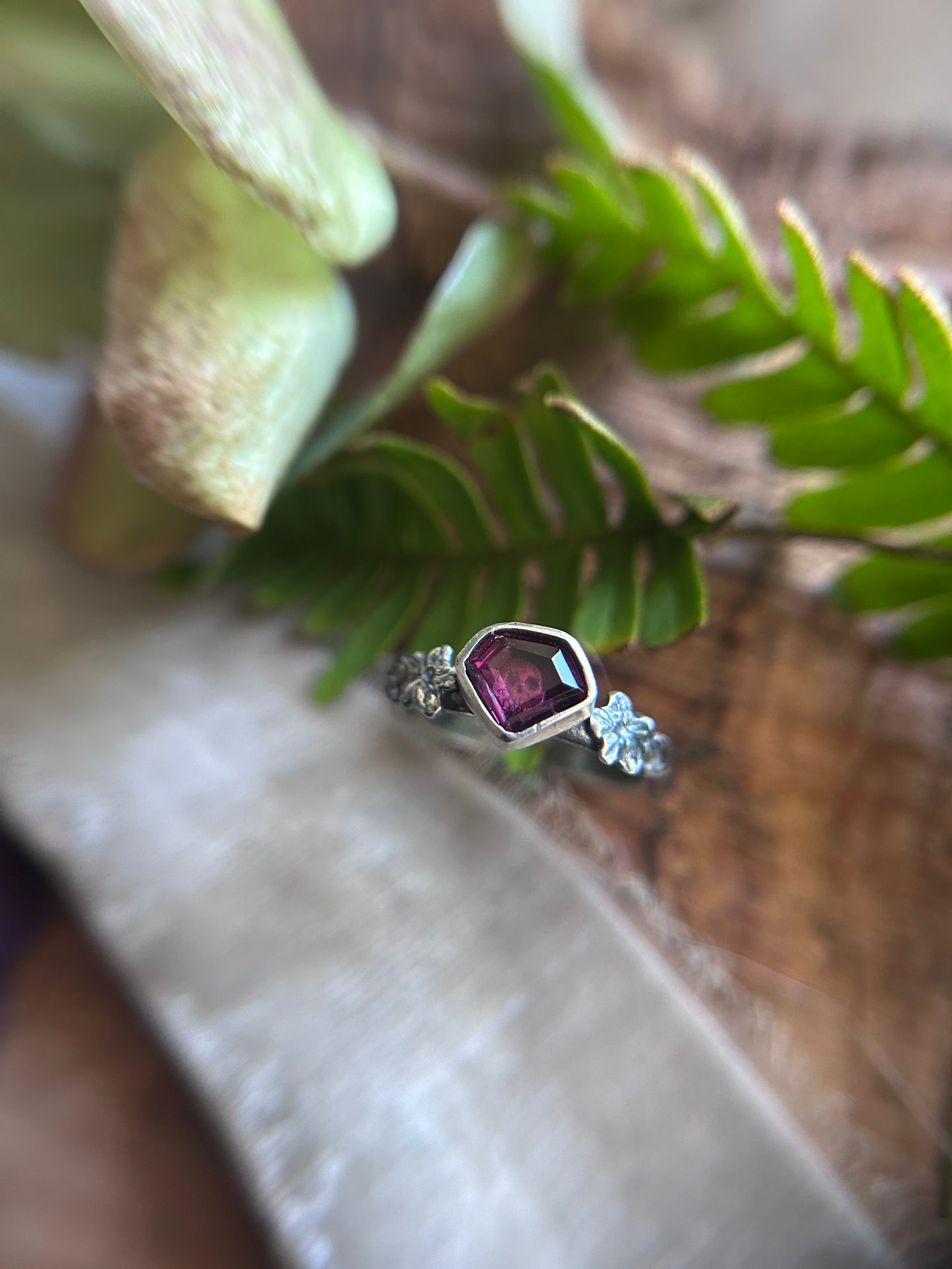 Azalea flowers and skull ring with portrait cut shield shaped rhodolite garnet- Sterling silver jewelry