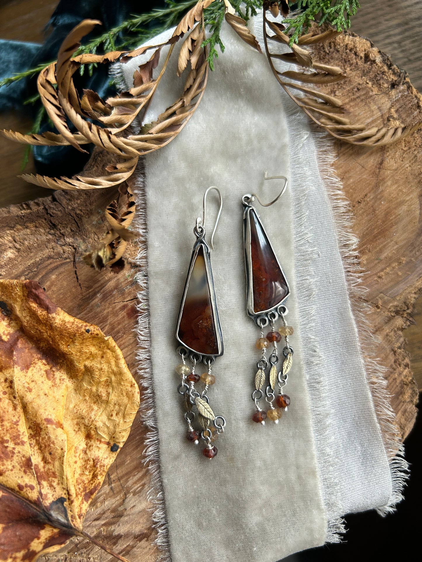 Carnelian Crow Earrings- sterling silver earrings with brass leaves and hessonite garnet details