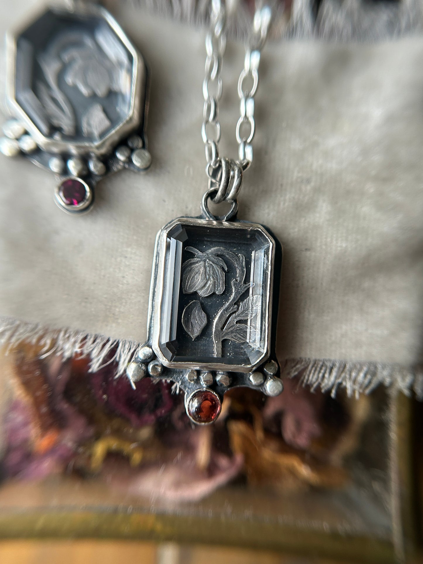 Enchanted Rose under Portrait Cut Quartz with garnet- sterling silver necklace