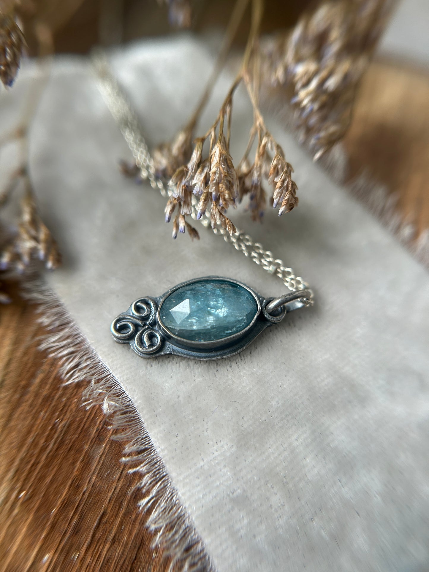 Aqua Kyanite with triskelle spirals and albatross- sterling silver necklace metalsmith made