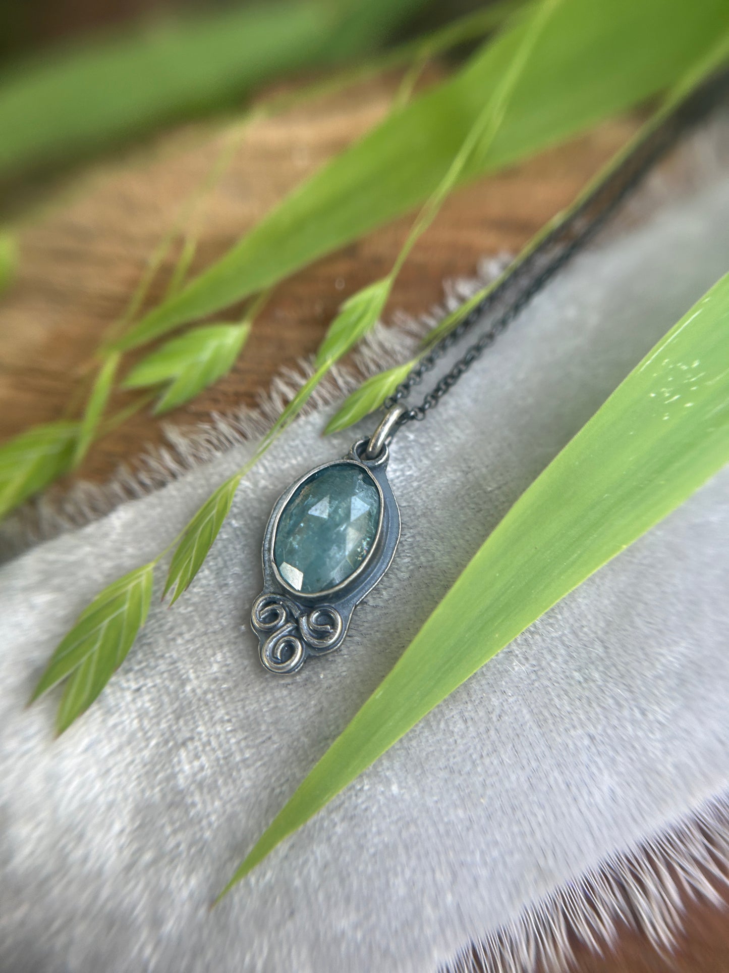 Aqua Kyanite with triskelle spirals and albatross- sterling silver necklace metalsmith made