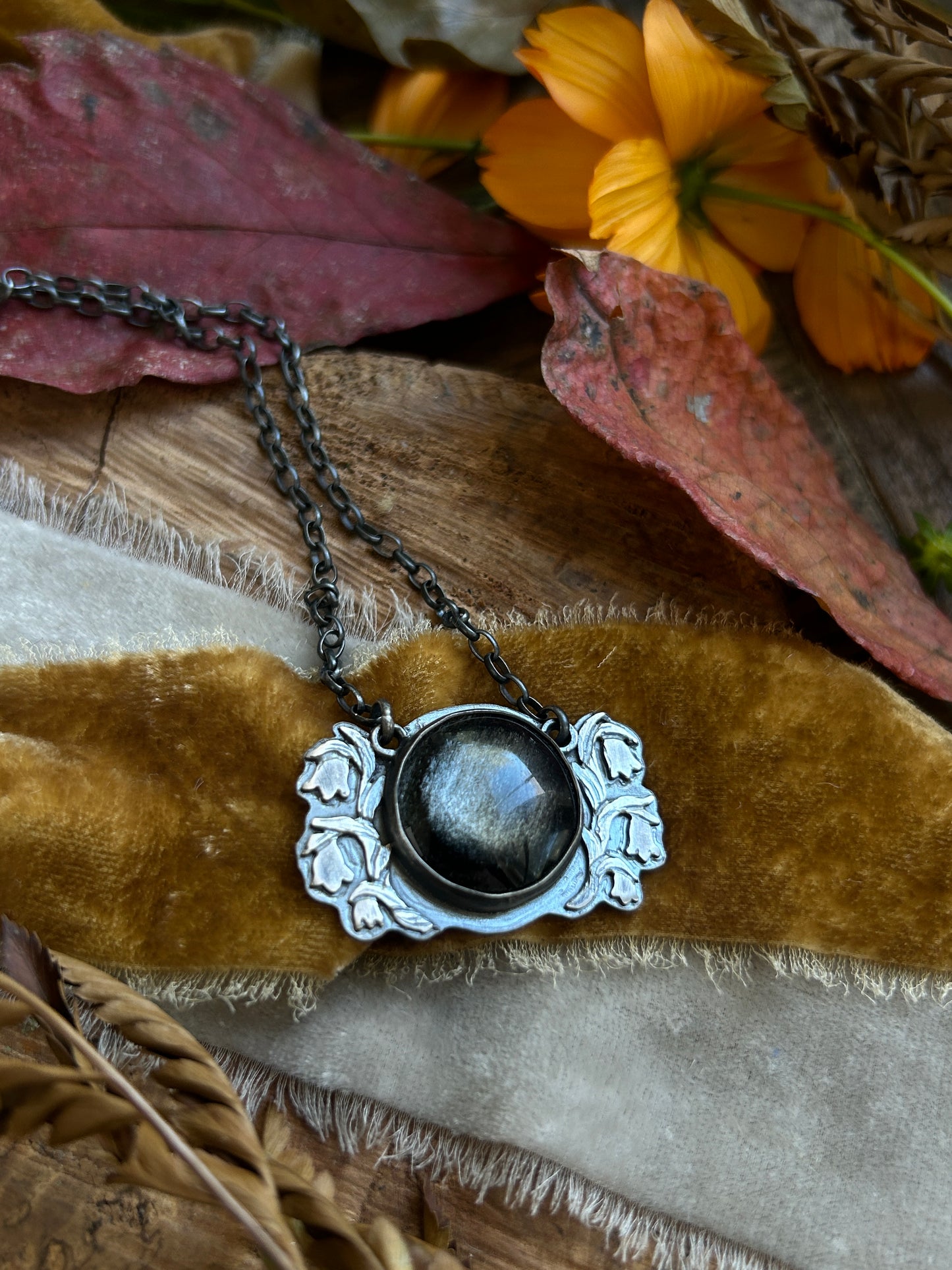 Silver sheen obsidian with ghost pipe mushrooms and moth necklace