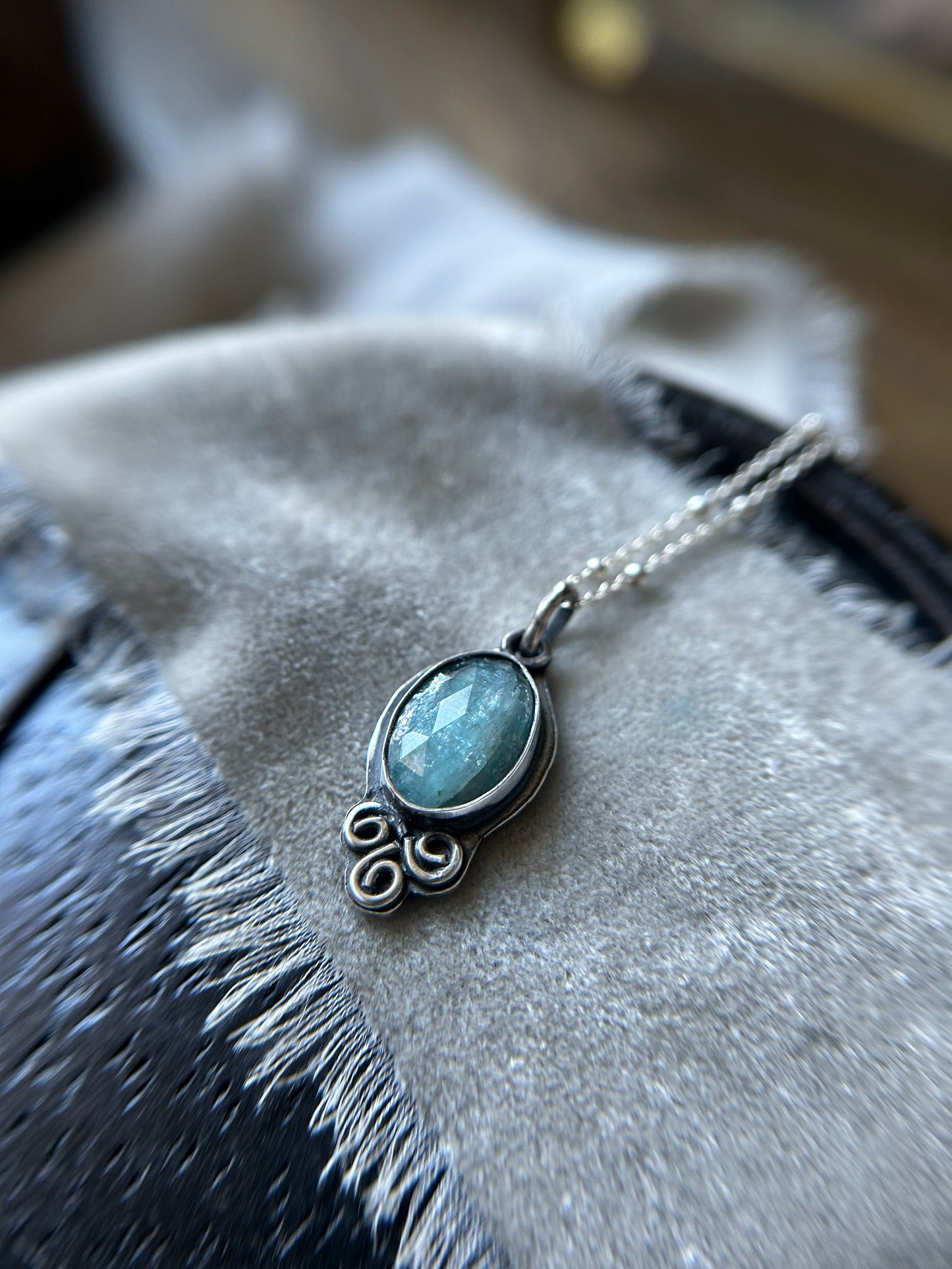 Aqua Kyanite with triskelle spirals and albatross- sterling silver necklace metalsmith made