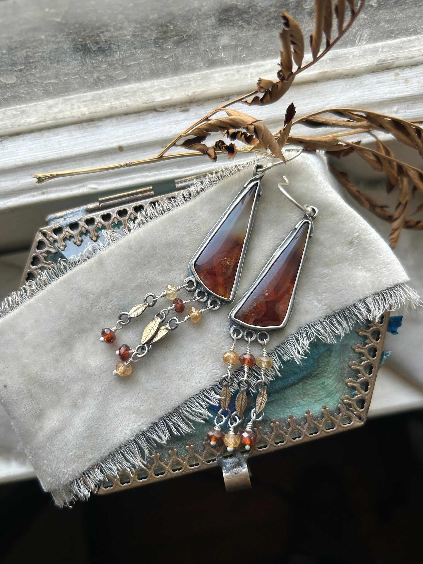 Carnelian Crow Earrings- sterling silver earrings with brass leaves and hessonite garnet details