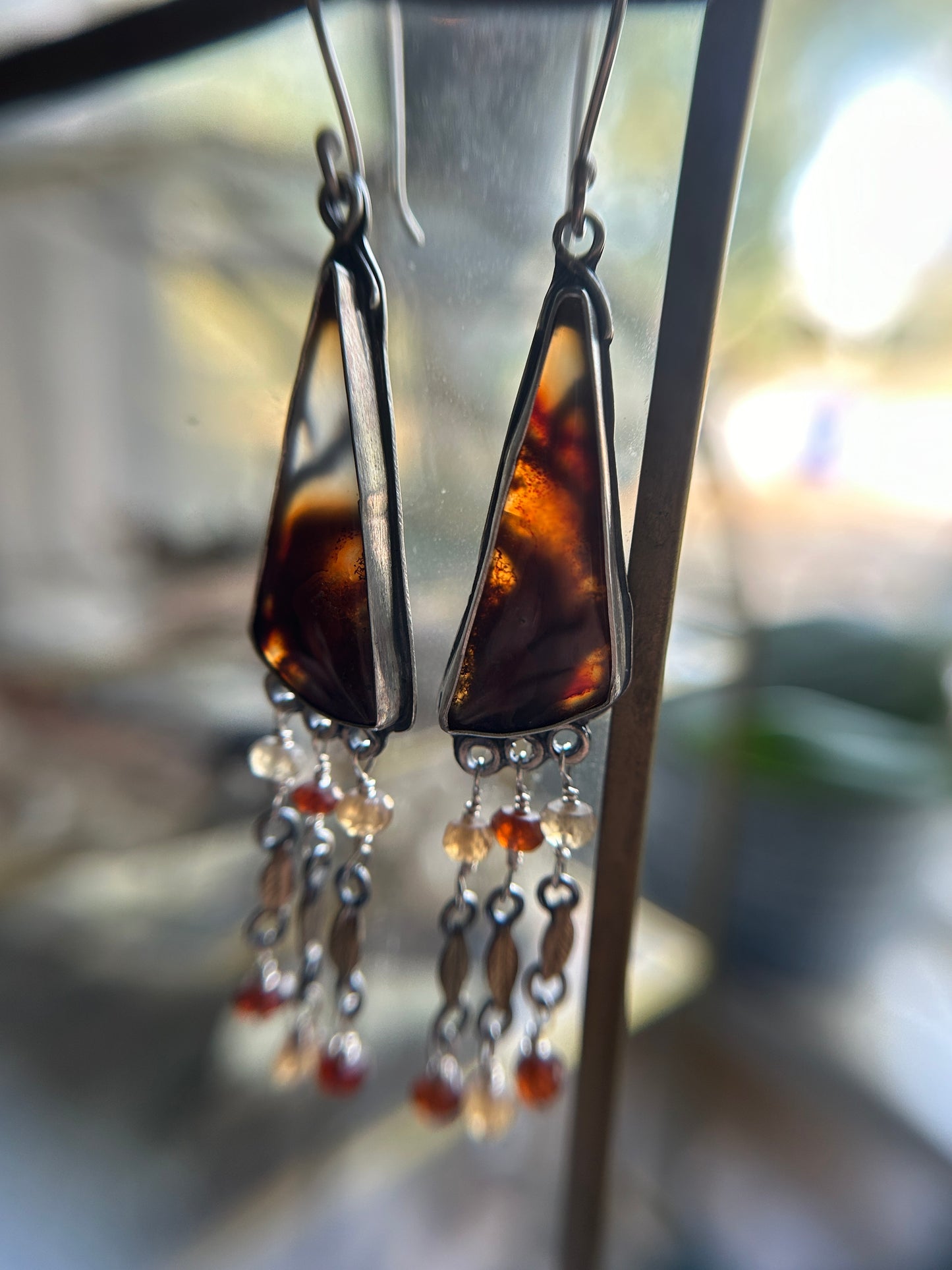 Carnelian Crow Earrings- sterling silver earrings with brass leaves and hessonite garnet details