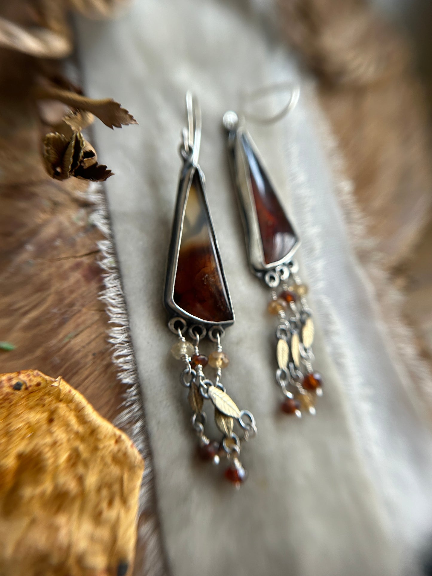 Carnelian Crow Earrings- sterling silver earrings with brass leaves and hessonite garnet details