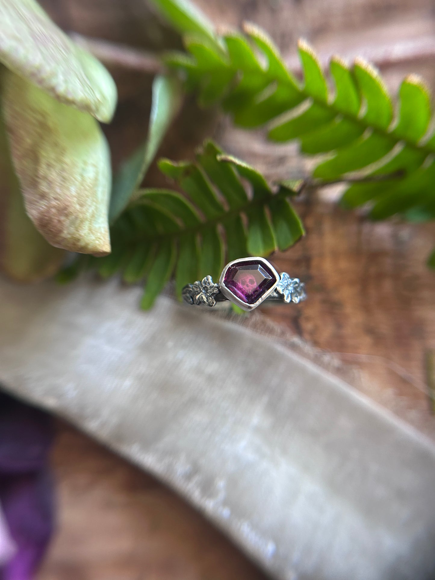 Azalea flowers and skull ring with portrait cut shield shaped rhodolite garnet- Sterling silver jewelry