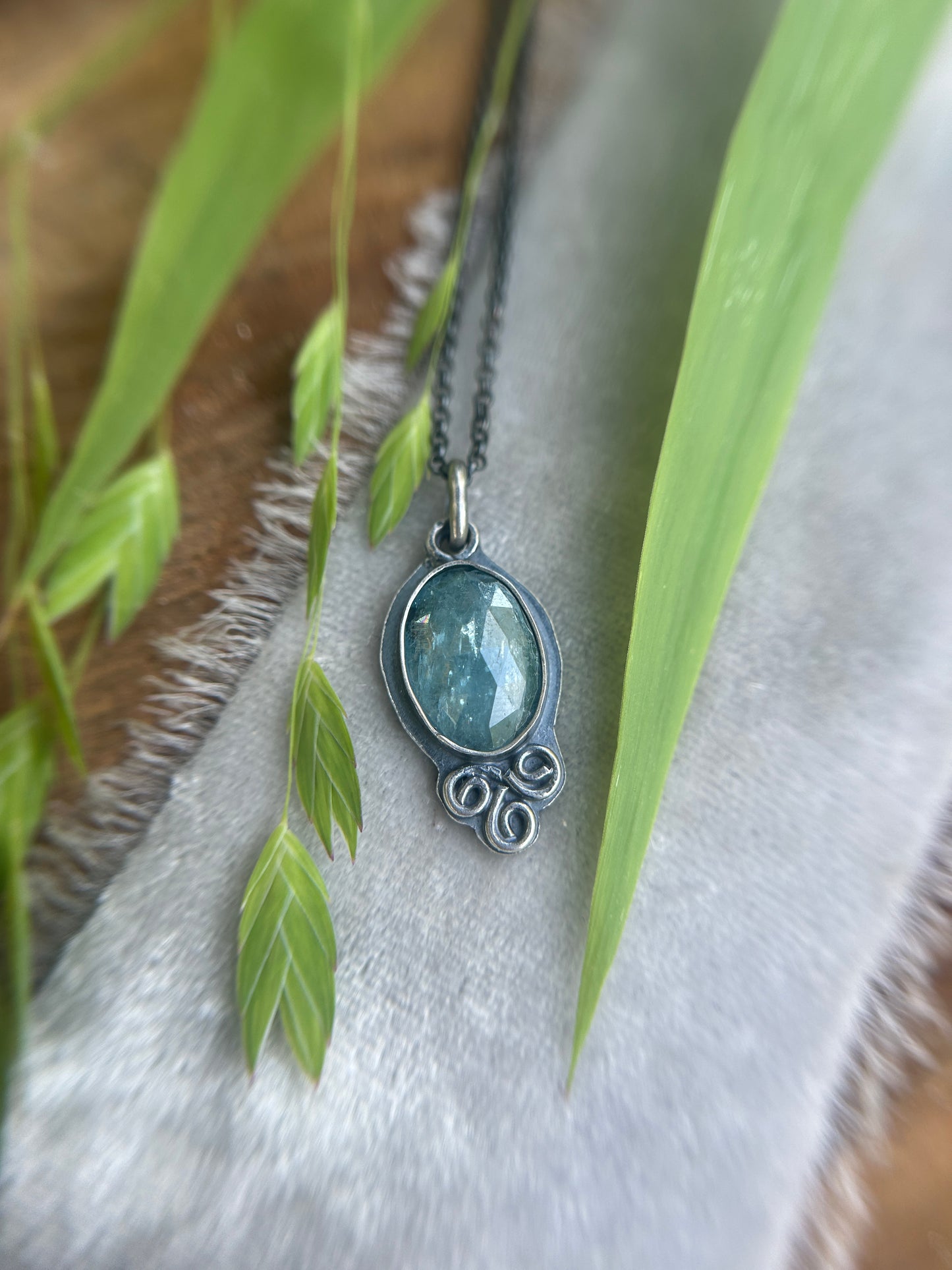 Aqua Kyanite with triskelle spirals and albatross- sterling silver necklace metalsmith made