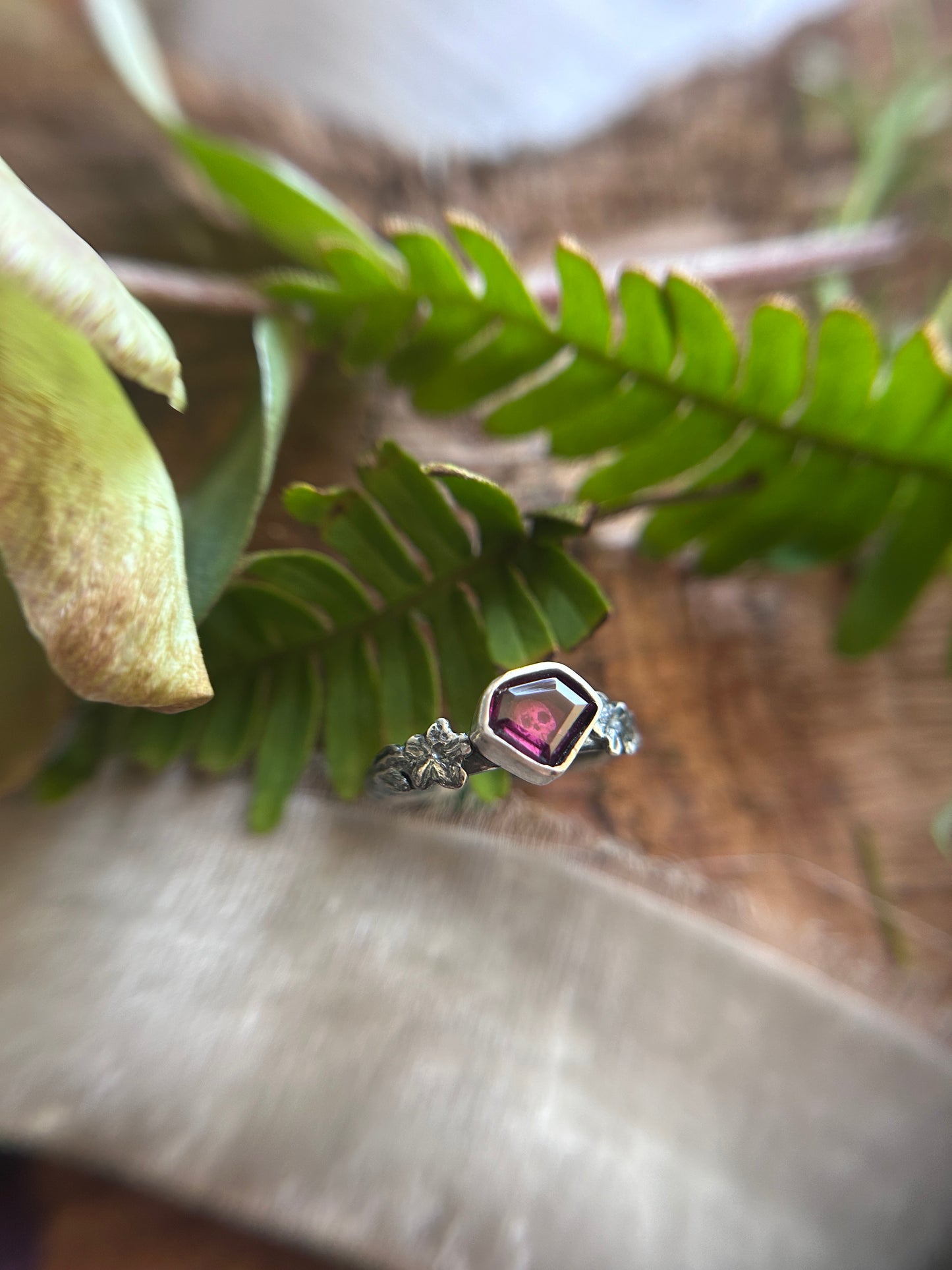 Azalea flowers and skull ring with portrait cut shield shaped rhodolite garnet- Sterling silver jewelry