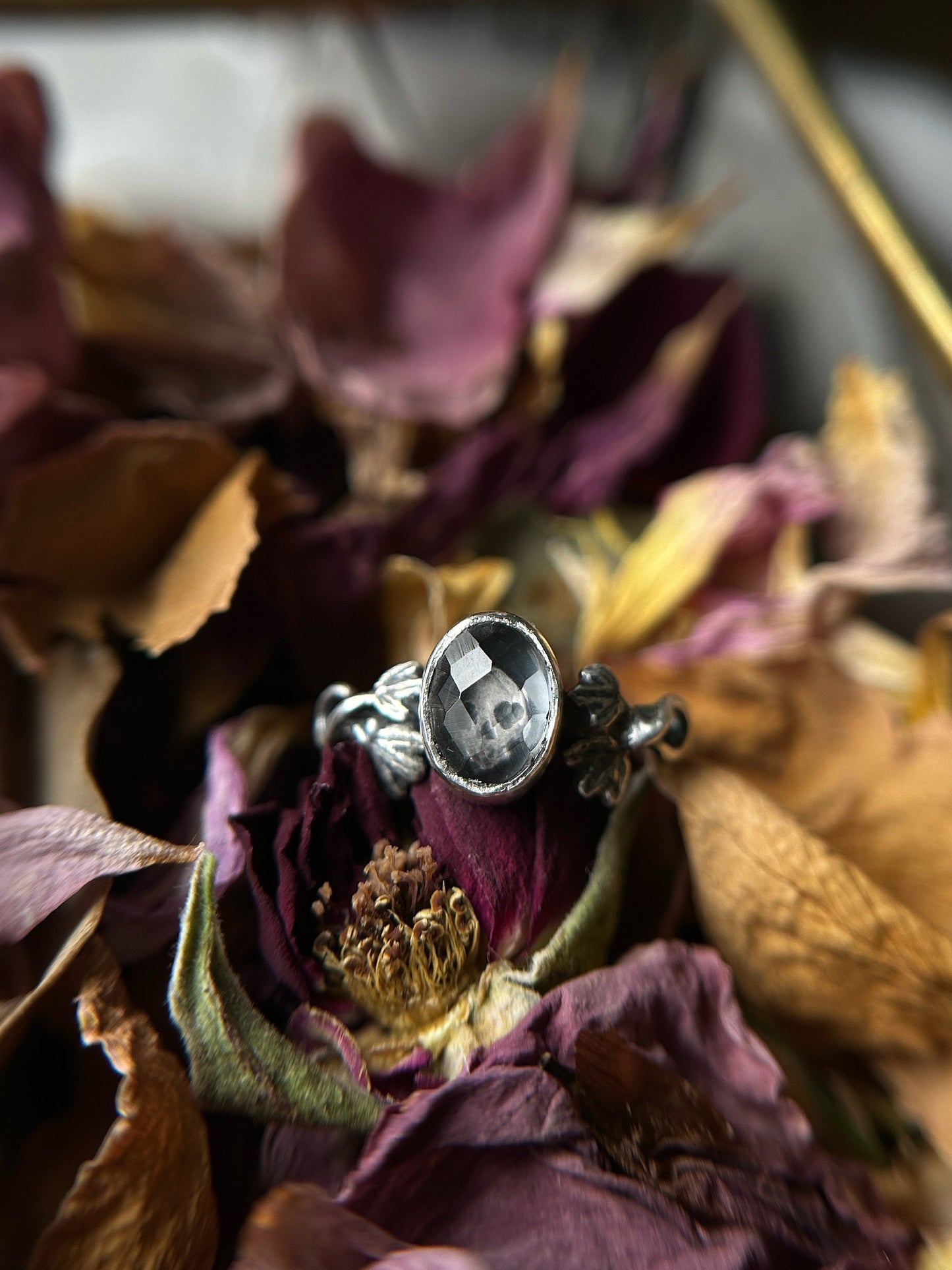 Quartz skull with ivy ring